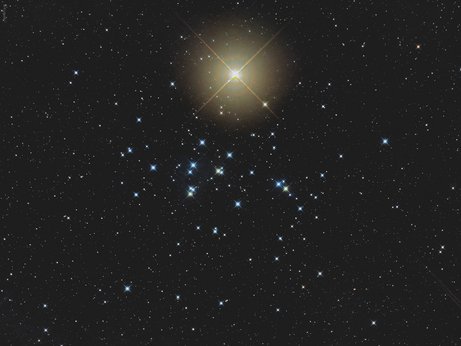 Space in our solar system, Mars, Venus and the beehive cluster flaring brightly against the black - Go to gallery